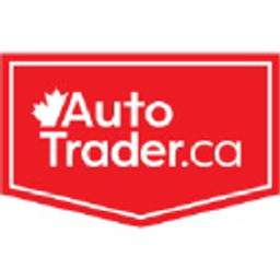 TRADER logo